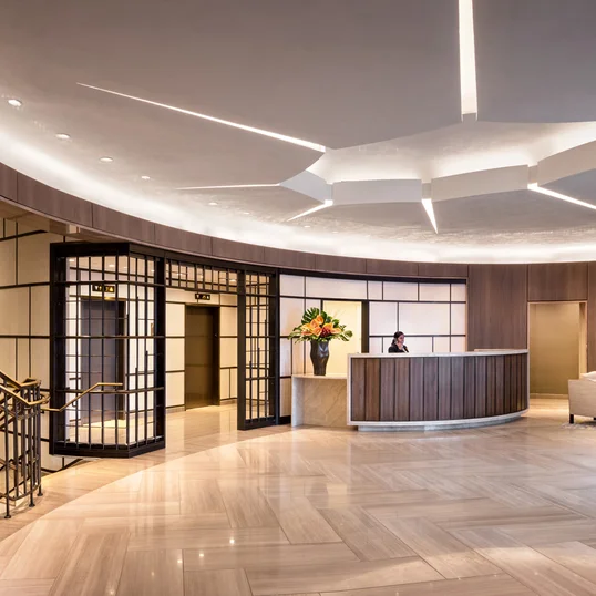 24-hour concierge and luxurious finishes of marble and bronzed metal.