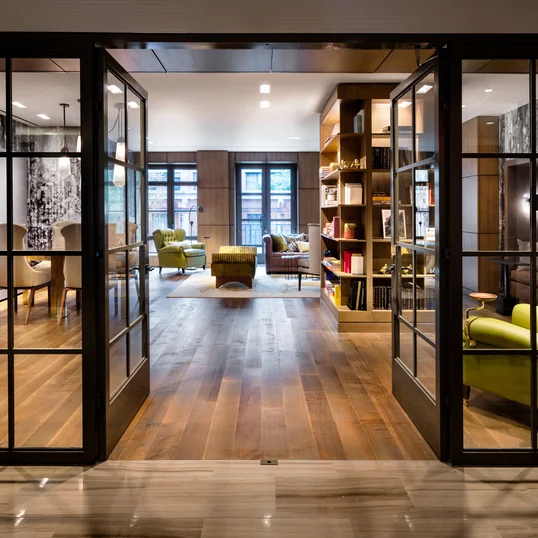 Relaxing library with fireplace.