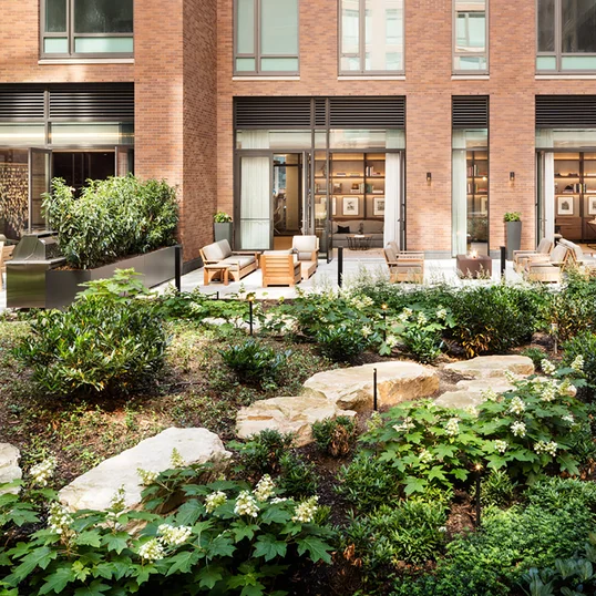 Lushly landscaped garden designed by Mathews Nielsen.