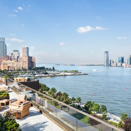 Mathews Nielsen designed rooftop with BBQ offers a panoramic vista of the Hudson River.