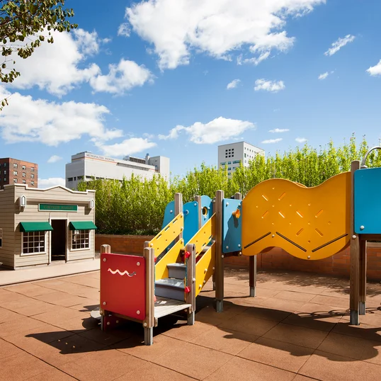 Kids enjoy the outdoor playground.