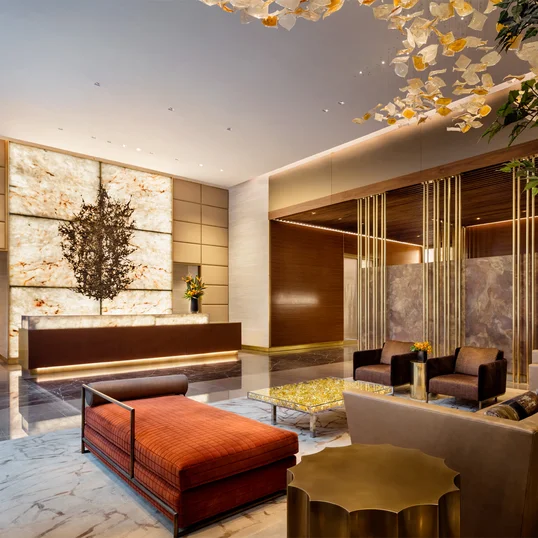 Sophisticated interior design by Andre Kikoski, including a richly decorated lobby and innovative gathering spaces. 