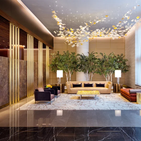 Sophisticated interior design by Andre Kikoski, including a richly decorated lobby and innovative gathering spaces. 