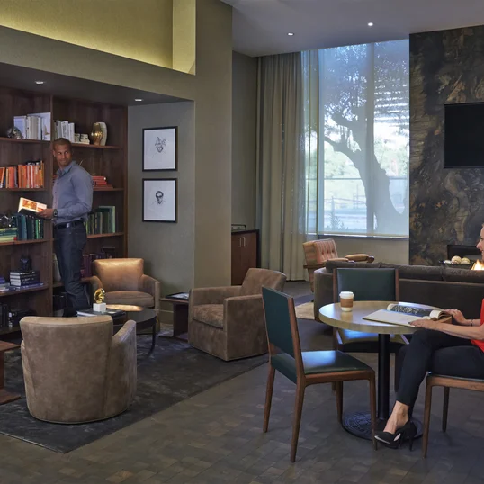 Fully wired technology lounge includes a coffee station.