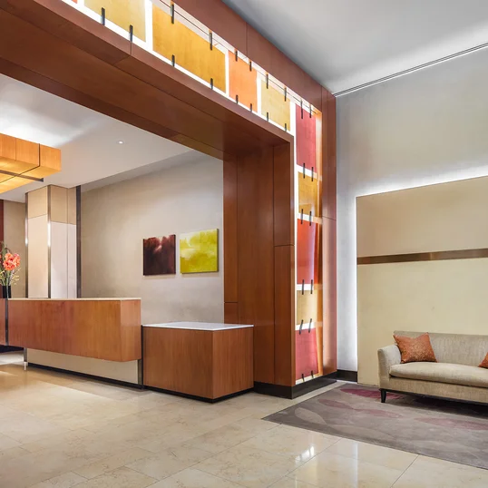 The modern lobby is attended 24 hours a day.