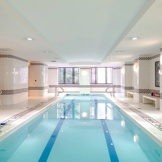 A heated swimming pool flooded with natural light, adjacent to a state-of-the-art health and fitness center, will inspire you to meet your fitness goals.
