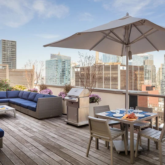 Stunning rooftop includes lounges and BBQ grills.