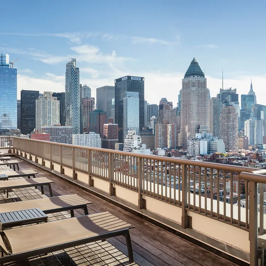 Stunning rooftop includes lounges and BBQ grills.