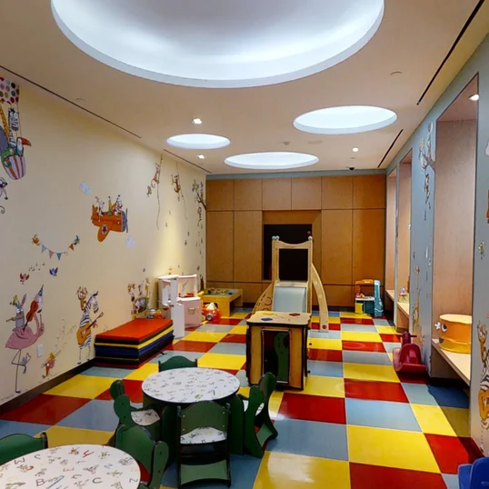 Located off the lobby, the children's playroom is designed to delight children.