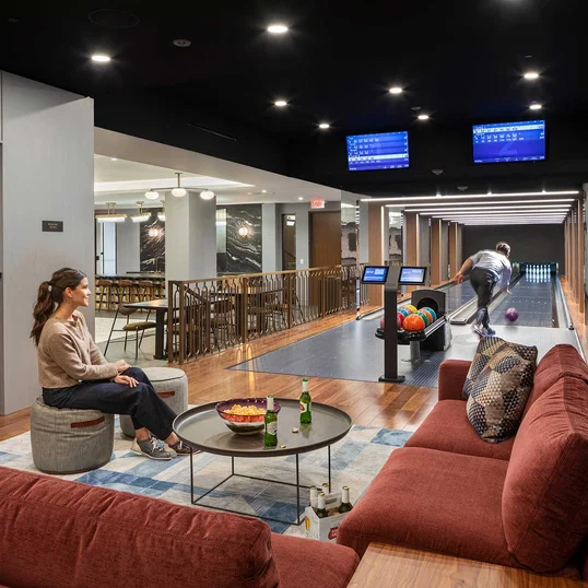 Host parties in the bowling lounge and game room, equipped with a piano, karaoke bar, and arcade games. 