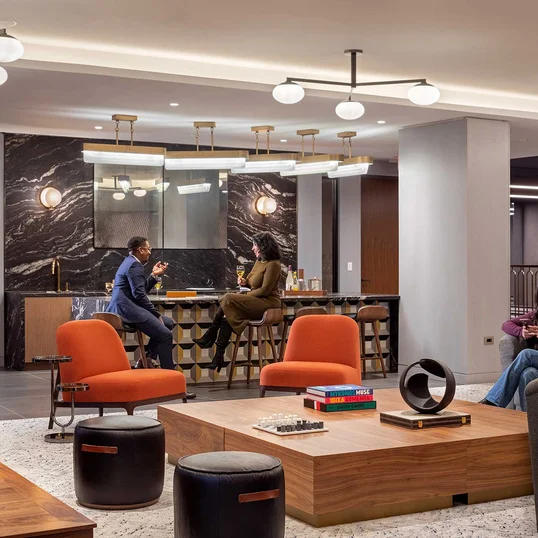 Game Lounge with two-lane bowling alley, karaoke bar, and arcade games