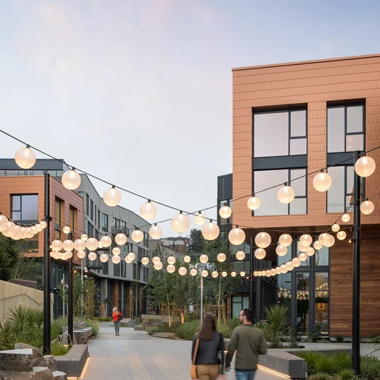 Landscaped courtyards with outdoor grills and dining