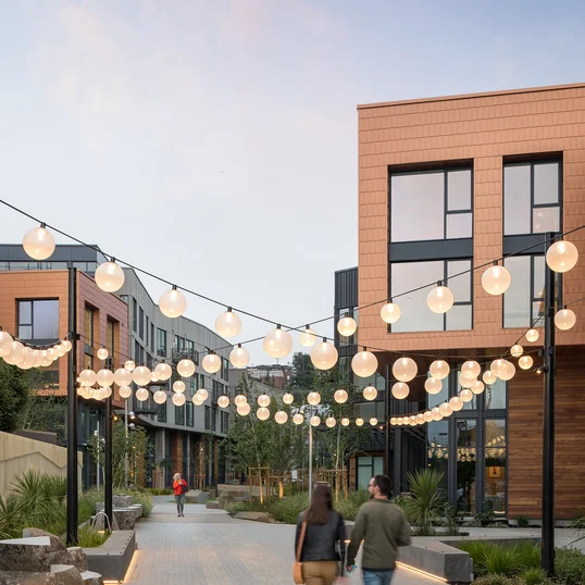 Landscaped courtyards with outdoor grills and dining