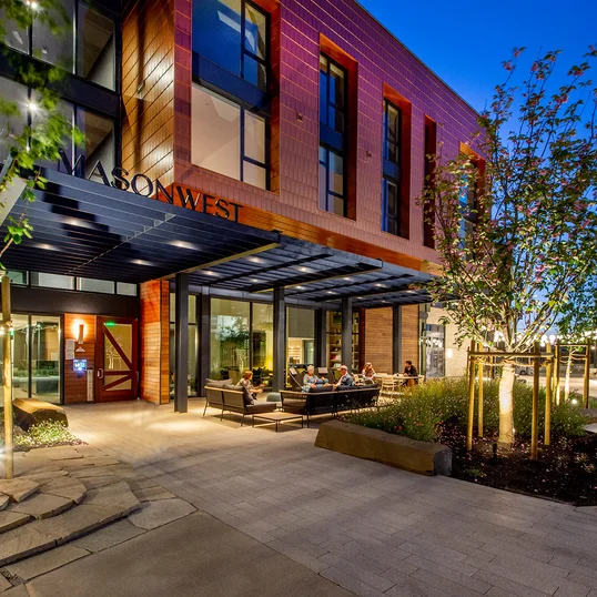 Landscaped courtyards with outdoor grills and dining