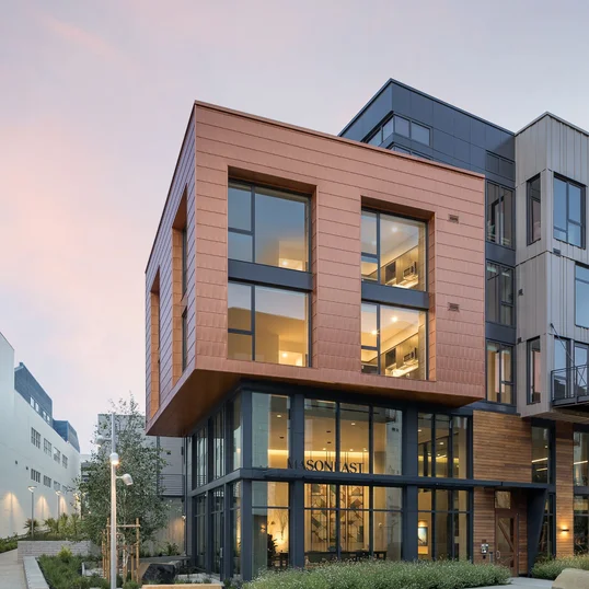 Landscaped courtyards with outdoor grills and dining