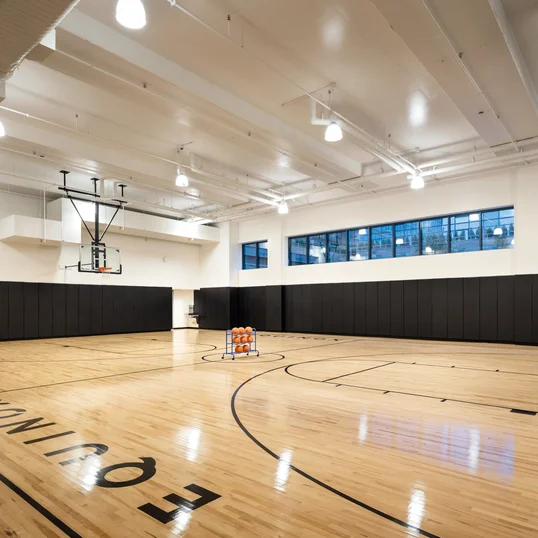 On-site full regulation basketball court.