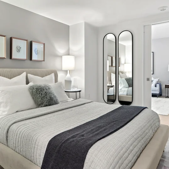 Spacious and comfortable primary bedroom with large closet space