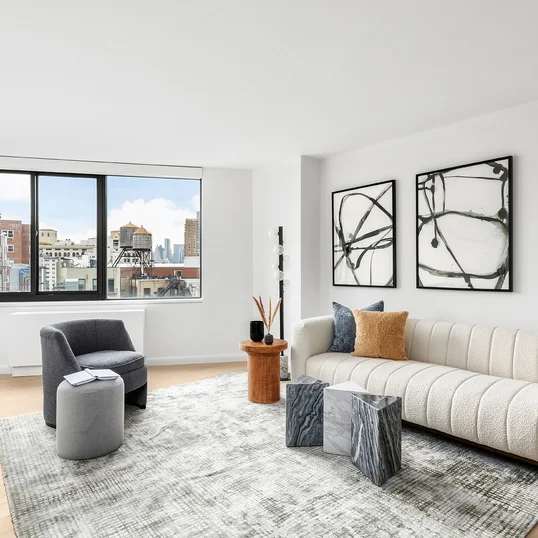 The unit is flooded with light with features oversized windows, generous layouts, abundance of closet space.