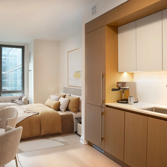 Custom five-inch wide oak hardwood flooring throughout living spaces.